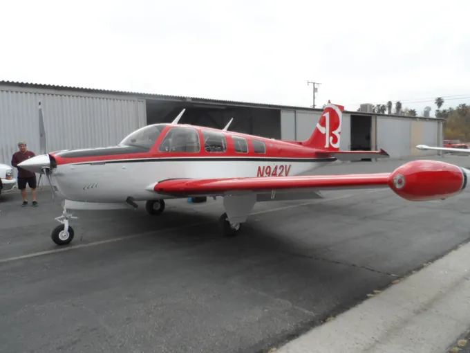 Classic silver aircraft with red accents